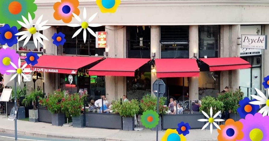 Вид на ресторан Le Café du Marais Вход в Le Café du Marais